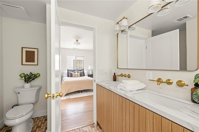 4131 Edgehill Dr, Los Angeles, CA 90008 - bathroom with double vanity and ensuite bath