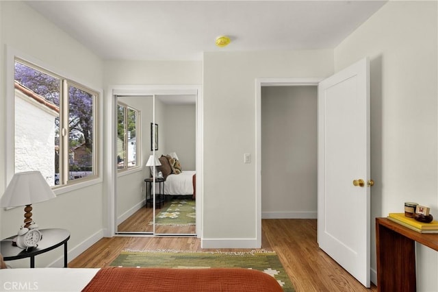 4131 Edgehill Dr, Los Angeles, CA 90008 - bedroom featuring a closet and wood finished floors