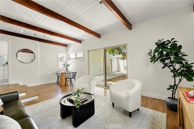 4131 Edgehill Dr, Los Angeles, CA 90008 - living room with wood finished floors and a wood ceiling with exposed beams