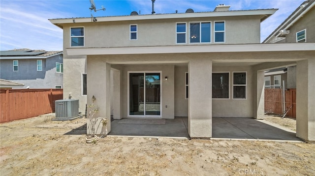 3360 Hammock St, Perris, CA 92571 - back of property featuring stucco siding, a patio area, and a chimney