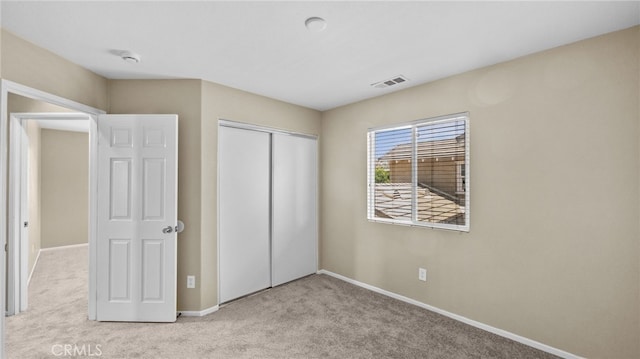 3360 Hammock St, Perris, CA 92571 - unfurnished bedroom featuring carpet flooring and a closet