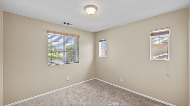 3360 Hammock St, Perris, CA 92571 - empty room featuring carpet and baseboards