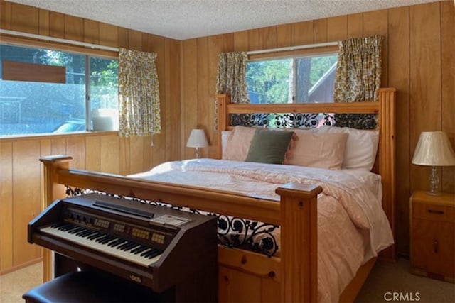 22908 Redwood Way, Crestline, CA 92325 - bedroom with a textured ceiling, wooden walls, and light carpet