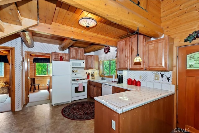 29729 Katherine Way, Cedar Glen, CA 92321 - kitchen featuring white appliances, plenty of natural light, brown cabinetry, tasteful backsplash, and a wooden ceiling with exposed beams