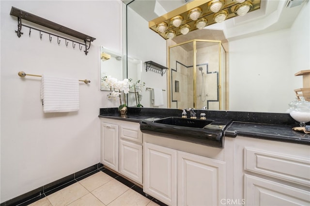 275 E 24th St, Upland, CA 91784 - full bathroom featuring tile patterned floors, a stall shower, and vanity