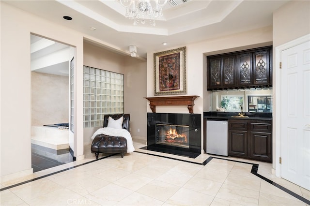 275 E 24th St, Upland, CA 91784 - indoor bar with dishwasher, a fireplace with flush hearth, inlaid floor details, a chandelier, and recessed lighting