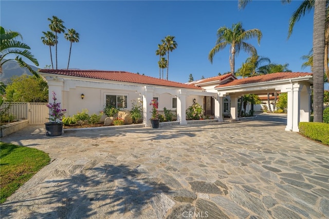 275 E 24th St, Upland, CA 91784 - mediterranean / spanish-style house with a tile roof and stucco siding