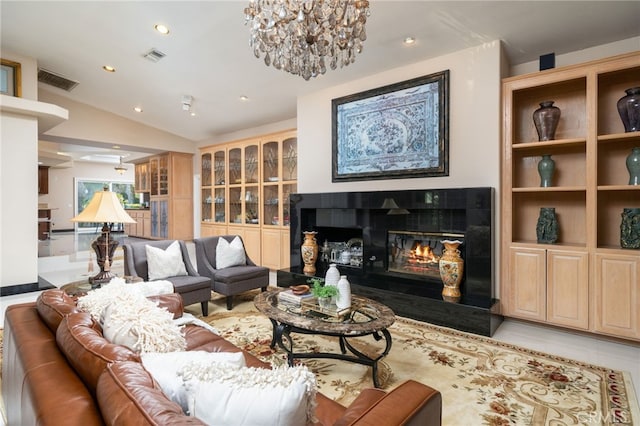 275 E 24th St, Upland, CA 91784 - tiled living room featuring lofted ceiling, a fireplace, recessed lighting, and a chandelier