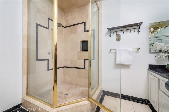 275 E 24th St, Upland, CA 91784 - bathroom with vanity, a stall shower, and tile patterned flooring