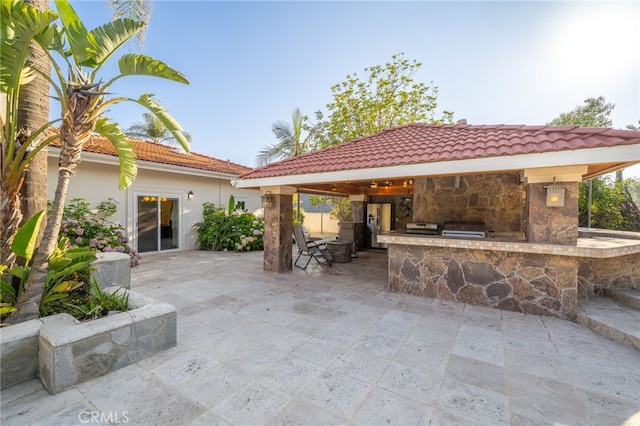 275 E 24th St, Upland, CA 91784 - view of patio / terrace featuring exterior kitchen and a gazebo