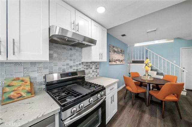 120 Poxon Pl, West Covina, CA 91790 - kitchen featuring stainless steel gas range oven, under cabinet range hood, decorative backsplash, and white cabinets