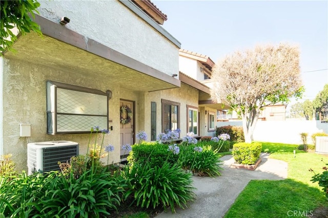 120 Poxon Pl, West Covina, CA 91790 - doorway to property with stucco siding and a tile roof