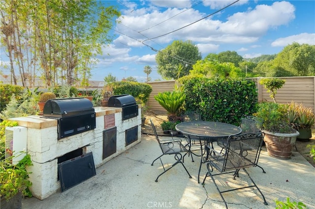 120 Poxon Pl, West Covina, CA 91790 - fenced backyard featuring an outdoor kitchen, a patio, and outdoor dining area
