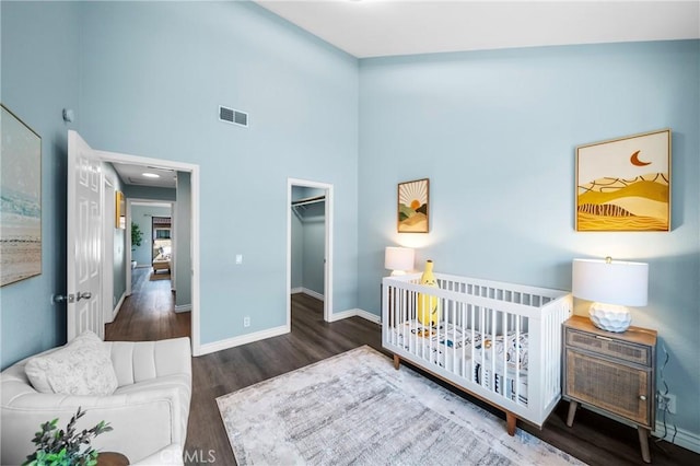 120 Poxon Pl, West Covina, CA 91790 - bedroom featuring wood finished floors, a spacious closet, and a closet