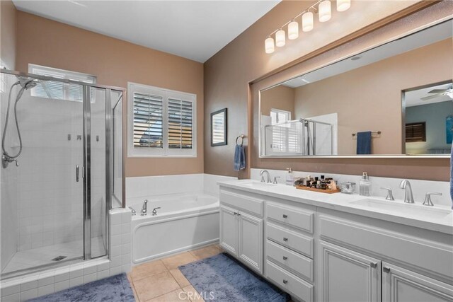 28518 High Ridge Dr, Saugus, CA 91390 - full bathroom with a shower stall, a garden tub, double vanity, and tile patterned floors