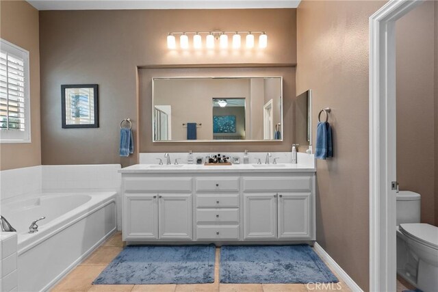 28518 High Ridge Dr, Saugus, CA 91390 - bathroom featuring double vanity, a bath, and tile patterned floors