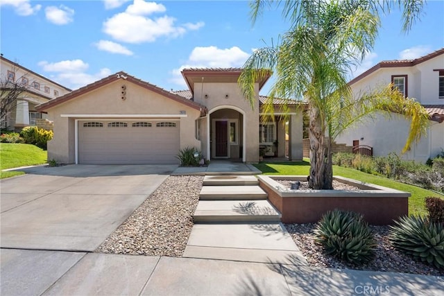 28518 High Ridge Dr, Saugus, CA 91390 - mediterranean / spanish house with stucco siding, a garage, driveway, and a tile roof