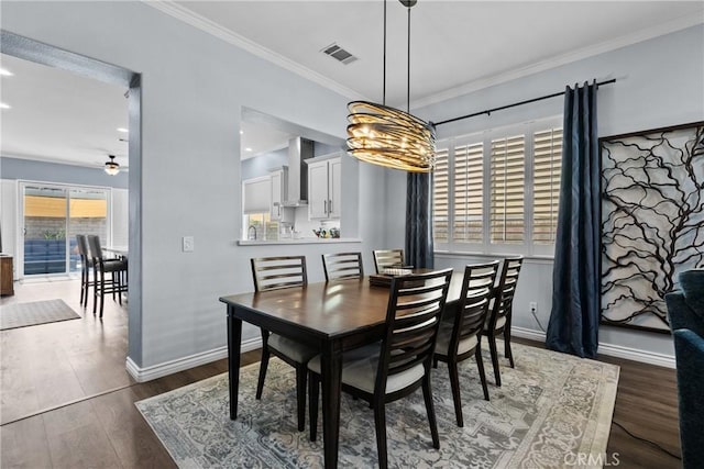 28518 High Ridge Dr, Saugus, CA 91390 - dining area with wood finished floors, ornamental molding, ceiling fan, and recessed lighting