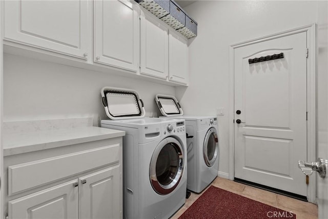 28518 High Ridge Dr, Saugus, CA 91390 - washroom with cabinet space, washing machine and dryer, and light tile patterned floors