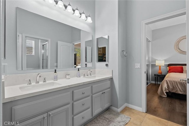 28518 High Ridge Dr, Saugus, CA 91390 - ensuite bathroom with double vanity, a shower with door, and tile patterned floors