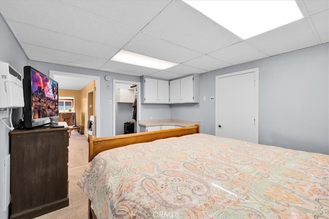 1638 Hales Dr Unit 29, Palms, CA 92277 - bedroom with a paneled ceiling, carpet, and a closet