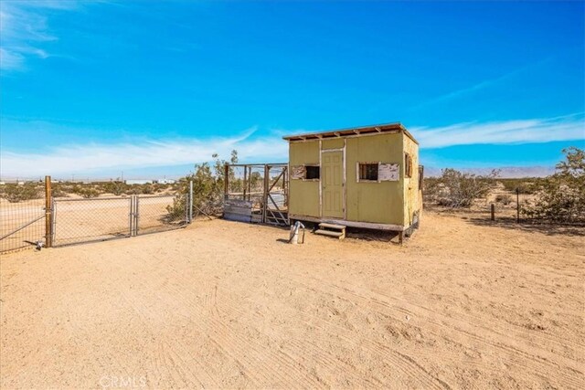 1638 Hales Dr Unit 29, Palms, CA 92277 - view of outbuilding with a gate