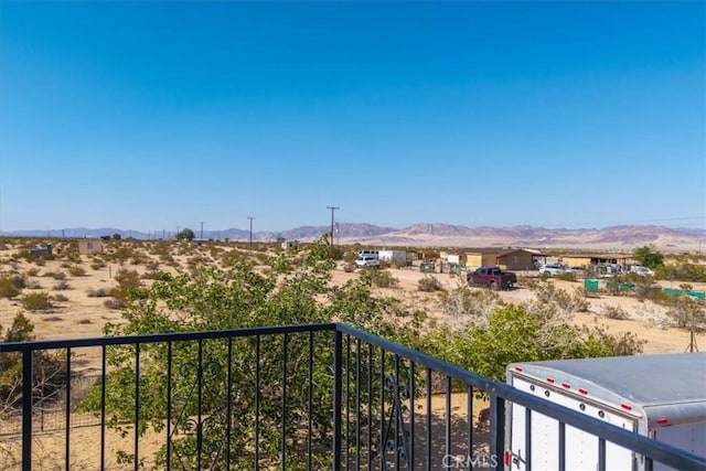 1638 Hales Dr Unit 29, Palms, CA 92277 - view of mountain background featuring rural landscape and a desert landscape