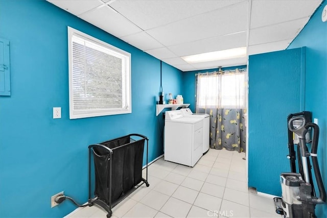 1638 Hales Dr Unit 29, Palms, CA 92277 - laundry area featuring washer and clothes dryer and tile patterned flooring