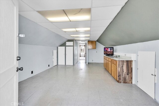 1638 Hales Dr Unit 29, Palms, CA 92277 - additional living space featuring vaulted ceiling and light flooring