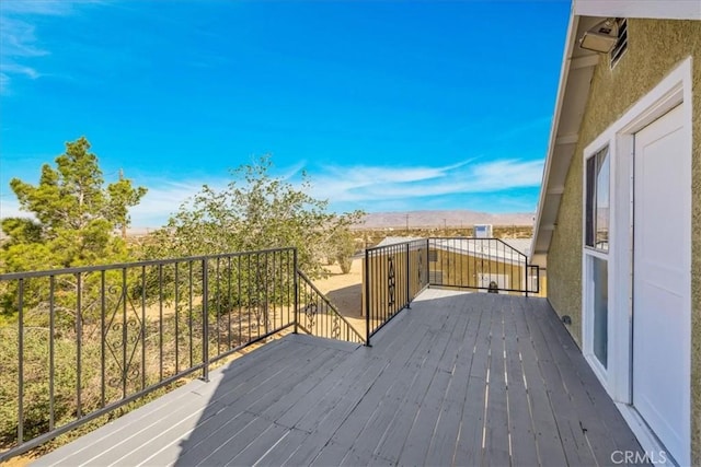 1638 Hales Dr Unit 29, Palms, CA 92277 - wooden terrace featuring a mountain view
