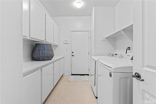 2041 Kalliope Ave, Lancaster, CA 93536 - laundry room with washing machine and clothes dryer and cabinet space
