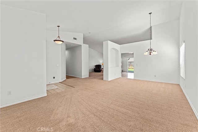 2041 Kalliope Ave, Lancaster, CA 93536 - unfurnished living room with carpet floors, a chandelier, and vaulted ceiling