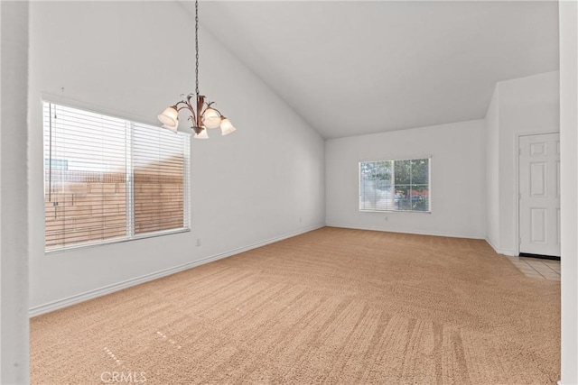 2041 Kalliope Ave, Lancaster, CA 93536 - unfurnished room with vaulted ceiling, a chandelier, and light carpet