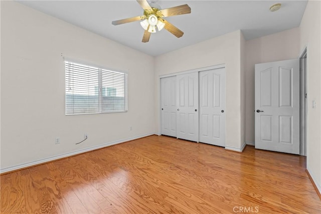 2041 Kalliope Ave, Lancaster, CA 93536 - unfurnished bedroom featuring light wood-style flooring, a closet, and a ceiling fan