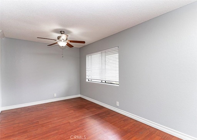 13100 Creek View Dr Unit 204, Garden Grove, CA 92844 - spare room with a ceiling fan, wood finished floors, and a textured ceiling