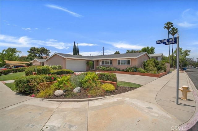 9545 Rubio Ave, Northridge, CA 91343 - ranch-style home with an attached garage and driveway