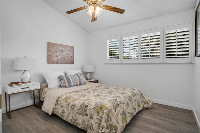 9545 Rubio Ave, Northridge, CA 91343 - bedroom with lofted ceiling, wood finished floors, ceiling fan, and a textured ceiling