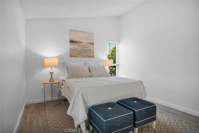 9545 Rubio Ave, Northridge, CA 91343 - bedroom featuring lofted ceiling and wood finished floors