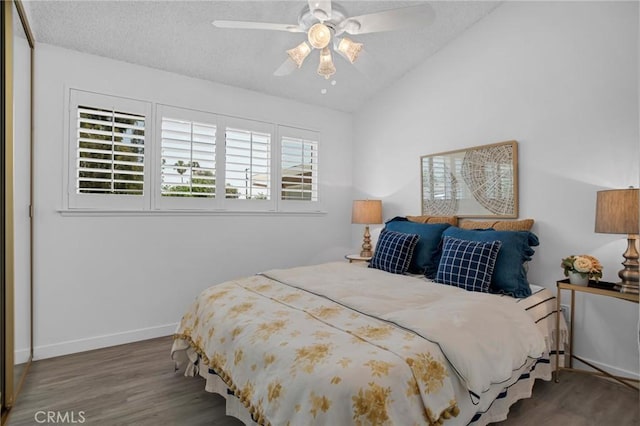 9545 Rubio Ave, Northridge, CA 91343 - bedroom featuring wood finished floors, vaulted ceiling, a textured ceiling, and ceiling fan