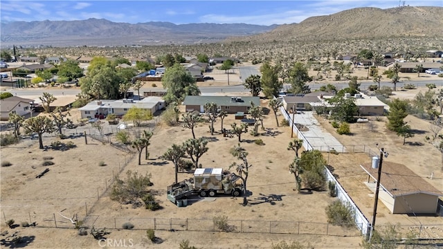 58706 Buena Vista Dr, Yucca Valley, CA 92284 - aerial view of residential area featuring a mountain backdrop