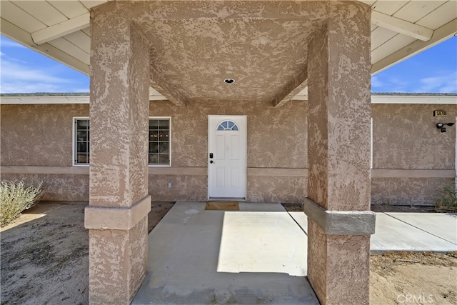 58706 Buena Vista Dr, Yucca Valley, CA 92284 - entrance to property with stucco siding and a patio