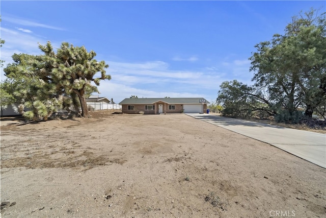 58706 Buena Vista Dr, Yucca Valley, CA 92284 - ranch-style home with a garage and concrete driveway