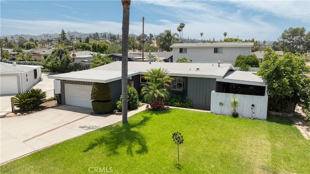 16140 Bycroft St, Hacienda Heights, CA 91745 - view of front of house featuring a front lawn, concrete driveway, and a garage