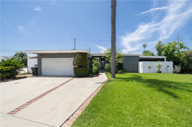 16140 Bycroft St, Hacienda Heights, CA 91745 - view of front of home featuring an attached garage, a front yard, and concrete driveway