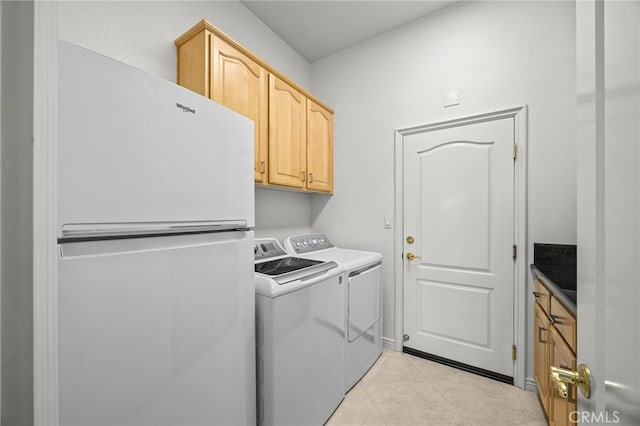 9116 Pinyon Point Ct, Corona, CA 92883 - laundry area with washer and clothes dryer, cabinet space, and light tile patterned flooring