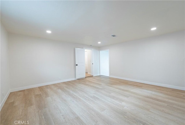 1818 W 79th St, Los Angeles, CA 90047 - unfurnished room with light wood finished floors and recessed lighting