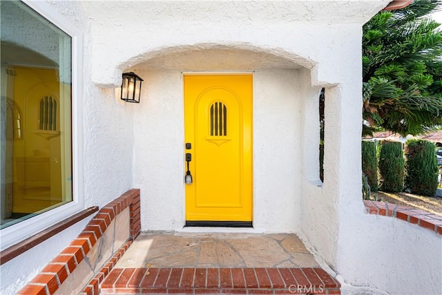 1818 W 79th St, Los Angeles, CA 90047 - view of exterior entry featuring stucco siding