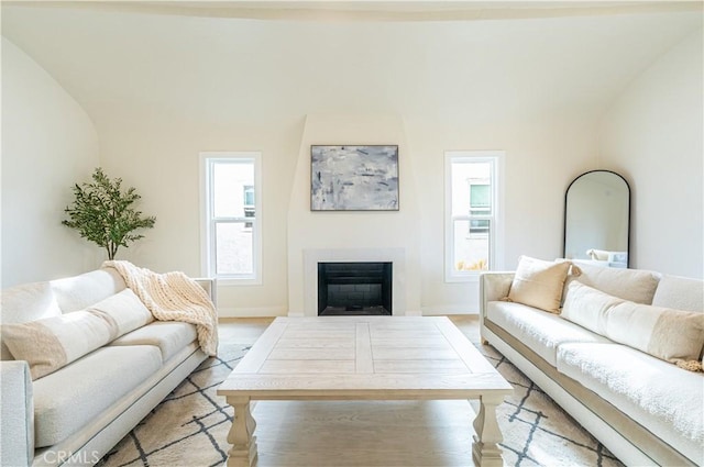 1818 W 79th St, Los Angeles, CA 90047 - living area featuring a fireplace, lofted ceiling, and wood finished floors