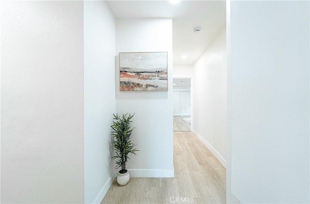 1818 W 79th St, Los Angeles, CA 90047 - corridor featuring light wood finished floors and baseboards