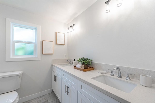 1818 W 79th St, Los Angeles, CA 90047 - bathroom with double vanity and toilet